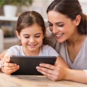 Child learning mathematics with a parent using an educational tablet