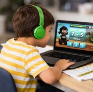 Child playing online math game on laptop for mental arithmetic practice